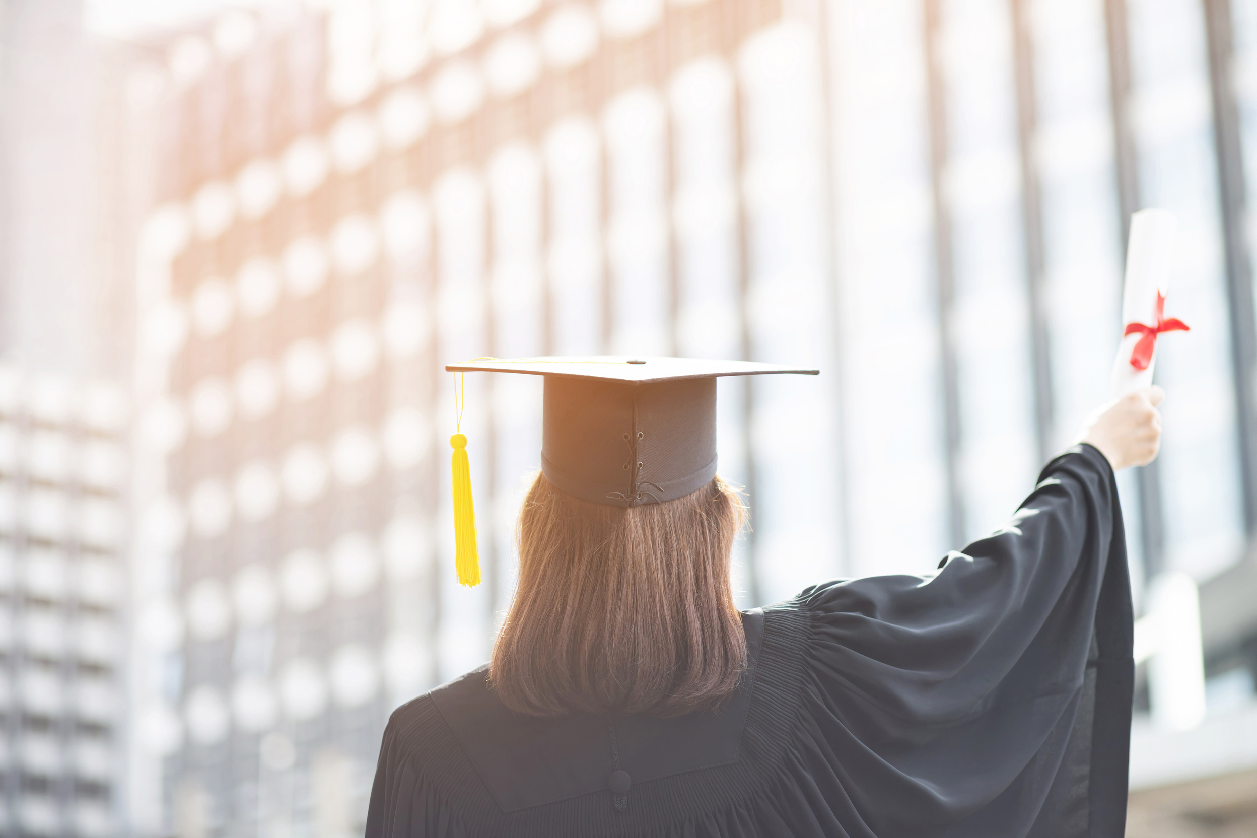 Female Graduate with Diploma